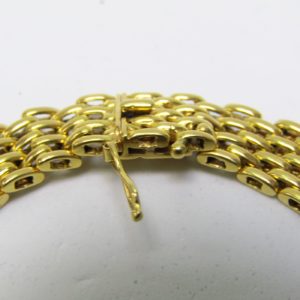 Pulsera Articulada de Oro Amarillo de 18k con eslabones en forma de malla. 25,60 gr.
