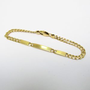 Pulsera Barbada de Oro Amarillo de 18k. con apliques a disposición.