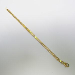 Pulsera Barbada de Oro Amarillo de 18k. con apliques a disposición.