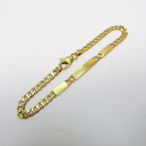 Pulsera Barbada de Oro Amarillo de 18k. con apliques a disposición.