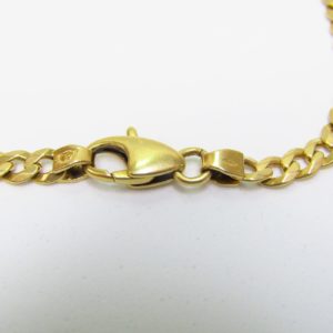 Pulsera Barbada de Oro Amarillo de 18k. con apliques a disposición.