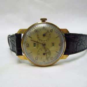 UNIVERSAL GENEVE. Reloj de Movimiento Complejo, de Pulsera para caballero. Oro 18k. Suiza, ca. 1940