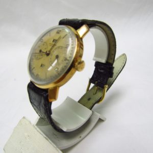 UNIVERSAL GENEVE. Reloj de Movimiento Complejo, de Pulsera para caballero. Oro 18k. Suiza, ca. 1940