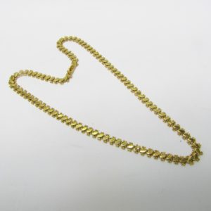 Collar articulado en Oro Amarillo, doble cara. Peso 27,5 gr.