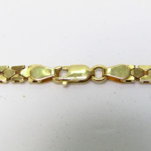 Collar en Oro Amarillo visto y matizado de 18k con apliques decorados. Peso 15,43 gr.