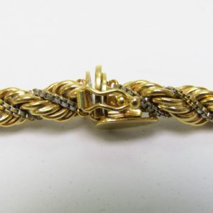 Cordón Salomónico con cadena Veneciana en Oro Bicolor de 18k. Peso: 47,20 gr.