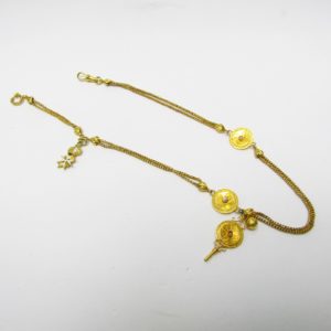 Leontina Antigua, Siglo XIX. Terminal-Cadena para reloj de Bolsillo. Oro 18k. Peso: 16,91 gr.
