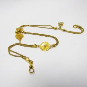 Leontina Antigua, Siglo XIX. Terminal-Cadena para reloj de Bolsillo. Oro 18k. Peso: 16,91 gr.