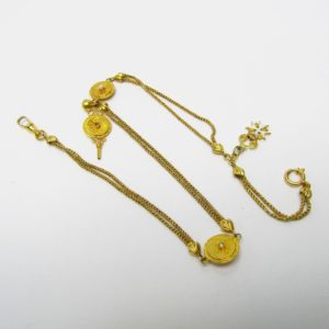 Leontina Antigua, Siglo XIX. Terminal-Cadena para reloj de Bolsillo. Oro 18k. Peso: 16,91 gr.