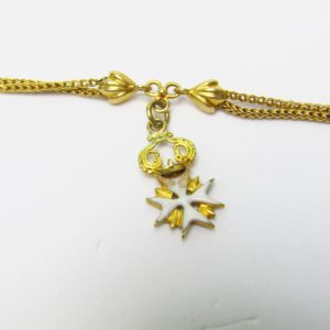 Leontina Antigua, Siglo XIX. Terminal-Cadena para reloj de Bolsillo. Oro 18k. Peso: 16,91 gr.