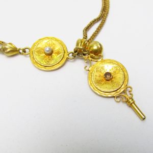 Leontina Antigua, Siglo XIX. Terminal-Cadena para reloj de Bolsillo. Oro 18k. Peso: 16,91 gr.