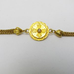 Leontina Antigua, Siglo XIX. Terminal-Cadena para reloj de Bolsillo. Oro 18k. Peso: 16,91 gr.