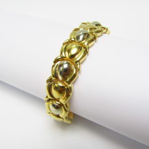 Pulsera articulada y reversible en Oro Bicolor de 18k. 30,80 gr.