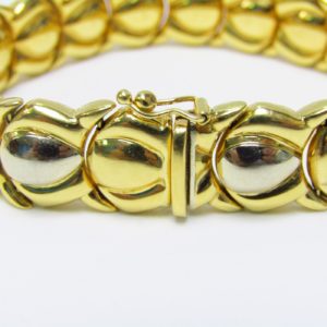 Pulsera articulada y reversible en Oro Bicolor de 18k. 30,80 gr.