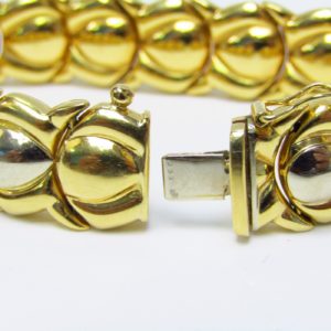 Pulsera articulada y reversible en Oro Bicolor de 18k. 30,80 gr.