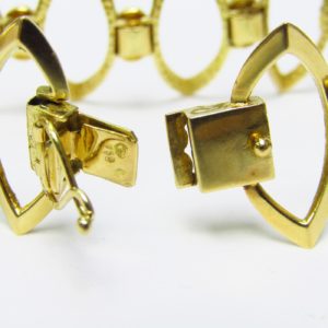 Pulsera de Oro Amarillo de 18K articulada con motivos ovales. 30 gr.