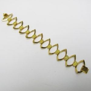 Pulsera de Oro Amarillo de 18K articulada con motivos ovales. 30 gr.
