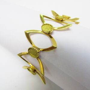 Pulsera de Oro Amarillo de 18K articulada con motivos ovales. 30 gr.
