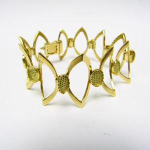 Pulsera de Oro Amarillo de 18K articulada con motivos ovales. 30 gr.