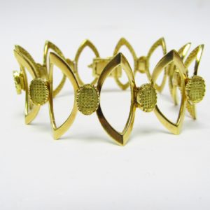 Pulsera de Oro Amarillo de 18K articulada con motivos ovales. 30 gr.