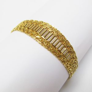 Pulsera de Oro Amarillo de 18k. Calada con adornos espirales. 20,03 gr.