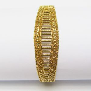 Pulsera de Oro Amarillo de 18k. Calada con adornos espirales. 20,03 gr.