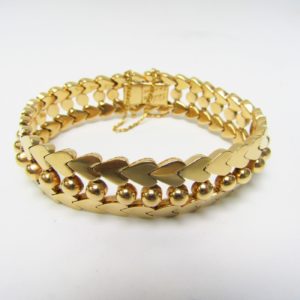 Pulsera de Oro de 18k. con cuentas esféricas y corazones. 47 gr.