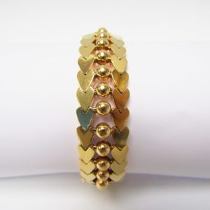 Pulsera de Oro de 18k. con cuentas esféricas y corazones. 47 gr.