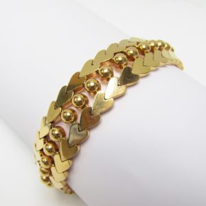 Pulsera de Oro de 18k. con cuentas esféricas y corazones. 47 gr.