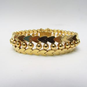 Pulsera de Oro de 18k. con cuentas esféricas y corazones. 47 gr.