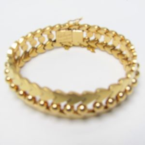 Pulsera de Oro de 18k. con cuentas esféricas y corazones. 47 gr.