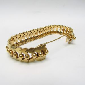 Pulsera de Oro de 18k. con cuentas esféricas y corazones. 47 gr.