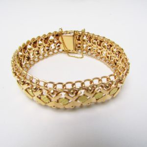Pulsera de Oro Doble Barbada, calada y articulada. 18k. 58 gr.