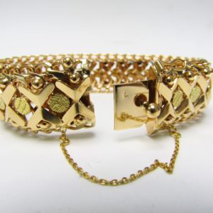 Pulsera de Oro Doble Barbada, calada y articulada. 18k. 58 gr.