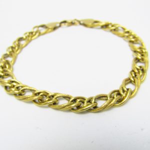 Pulsera en Oro de 18k con eslabones barbados lisos y matizados. 7,25 gr.