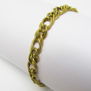 Pulsera en Oro de 18k con eslabones barbados lisos y matizados. 7,25 gr.