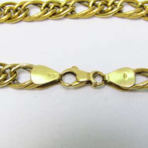 Pulsera en Oro de 18k con eslabones barbados lisos y matizados. 7,25 gr.