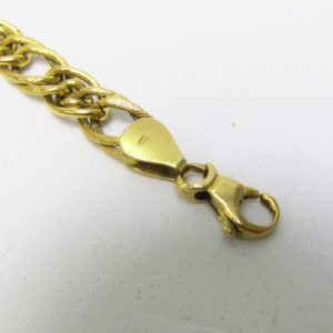 Pulsera en Oro de 18k con eslabones barbados lisos y matizados. 7,25 gr.