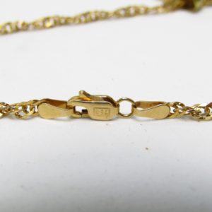 Collar sogueado con dos colgantes, "Sol y Luna", en Oro de 18k. 12,45 gr.