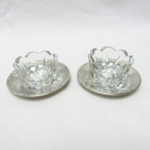 Conjunto de Salpimenteros, Palillero, Violetero y Mechero con sus bandejas. Plata de Ley, España, siglo XX.