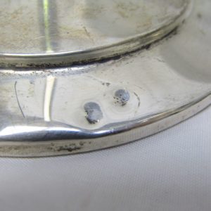 Conjunto de tres candeleros en Plata de Ley, España, siglo XX.