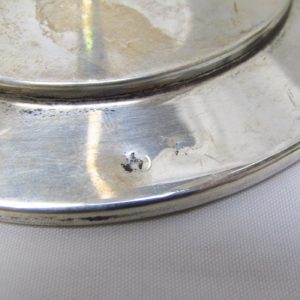 Conjunto de tres candeleros en Plata de Ley, España, siglo XX.