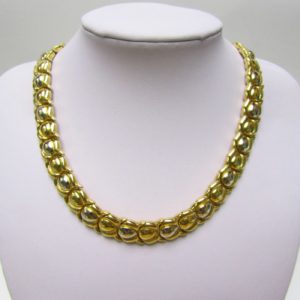 Gargantilla articulada y reversible en Oro Bicolor de 18k. 65,70