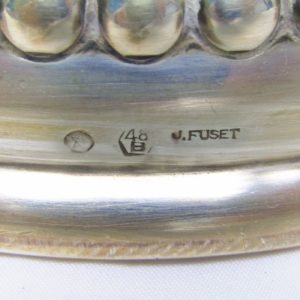J. FUSET. Pareja de candelabros de cinco luces en plata. España. Siglo XX.
