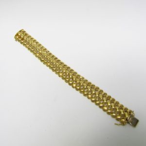 Loris Furini. Pulsera de malla Ancha en Oro Liso y Matizado, con tres filas de eslabones. 26,60 gr.