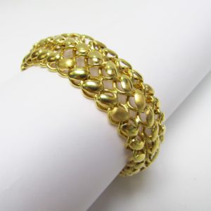 Loris Furini. Pulsera de malla Ancha en Oro Liso y Matizado, con tres filas de eslabones. 26,60 gr.