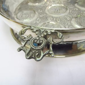 MG. Conjunto de Centro y Catavinos en plata. España, siglo XX.