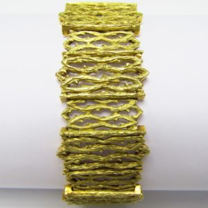 Pulsera Ancha de Oro articulada, Calada en figuras "Góticas". Oro Amarillo 18K. 69 gr.