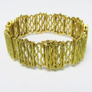 Pulsera Ancha de Oro articulada, Calada en figuras "Góticas". Oro Amarillo 18K. 69 gr.
