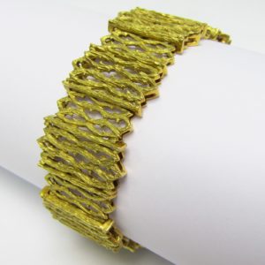 Pulsera Ancha de Oro articulada, Calada en figuras "Góticas". Oro Amarillo 18K. 69 gr.